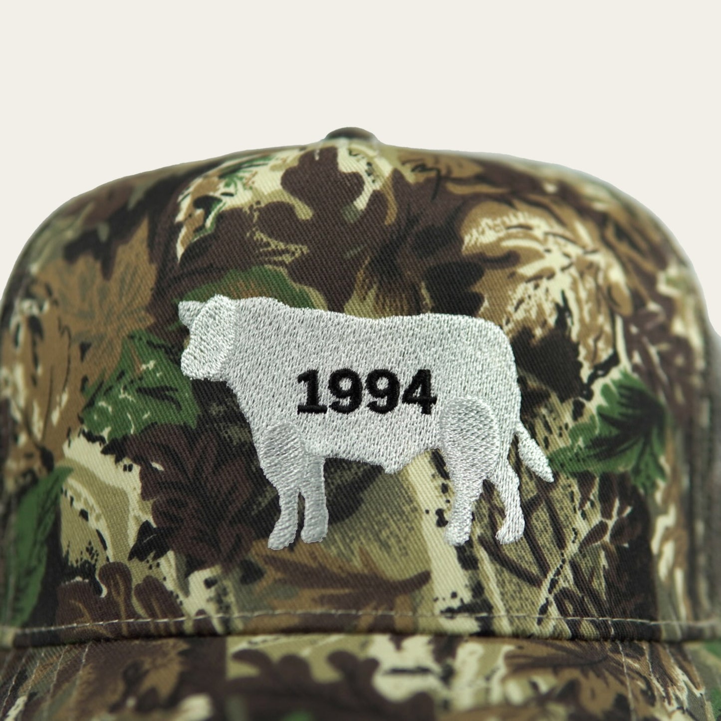 The “1994" Trucker Cap (CAMO)